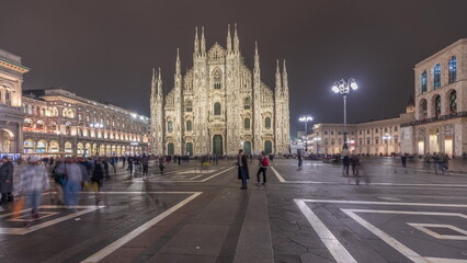 Obraz premium Panorama showing Milan Cathedral and Vittorio Emanuele gallery night timelapse.