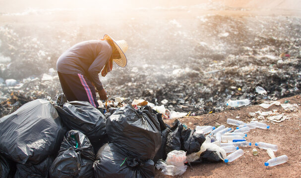 Garbage collector. waste plastic bottles and other types of plastic waste at the Thilafushi waste disposal site.