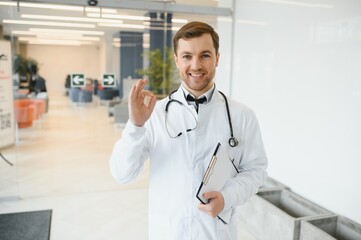 Portrait of friendly male doctor smiling