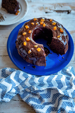 Chocolate bundt cake with coconut sugar and orange chocolate glaze