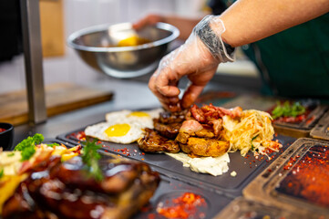 Professional chef cooking food in the kitchen restaurant
