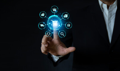 Businessman pointing to shopping icon online shopping concept online shopping