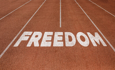 Freedom written on running track, New Concept on running track text in white color