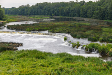 Venta Rapid (Ventas Rumba) waterfall, the widest waterfall in Europe and long brick bridge,...