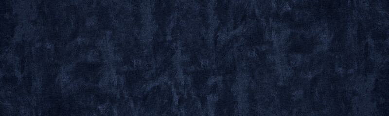 Navy blue wide panoramic textile texture. Indigo color abstract textured background. Dark dramatic wallpaper