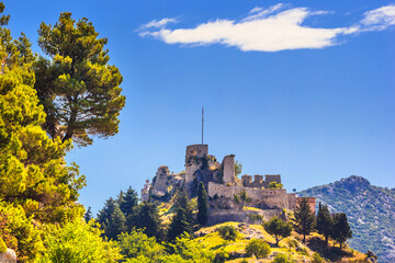 Summer landscape - view of the Klis Fortress near Split on the Adriatic coast of Croatia