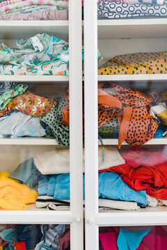Wardrobe with assorted cloth in workshop