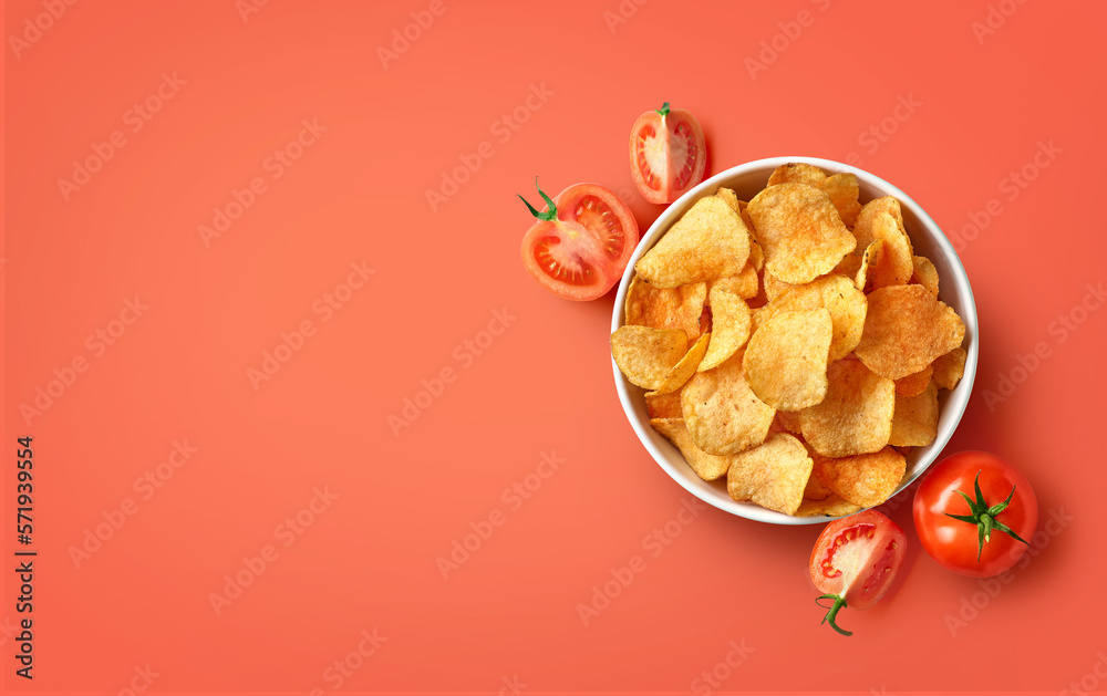 Wall mural Bowl of crispy potato chips or crisps with tomato flavor on red background