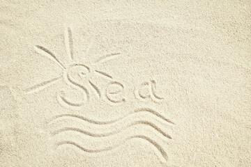 A drawing on the sand by the sea travel background