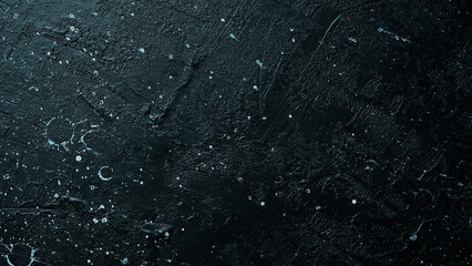 Black stone texture concrete background. Textured stone surface. Top view. Free space for text.
