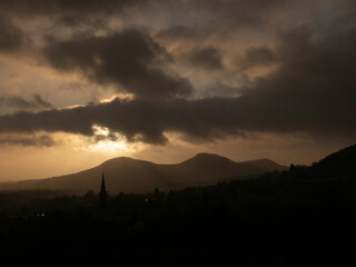 Fototapeta premium Dramatic Sunrise over Eildon Hills, Galashiels, Scottish Borders