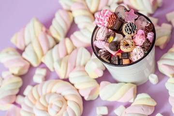 Marshmallows. Chewing candy close-up on a pink background. Dessert of sweet dishes in a white bucket. Pastel colors. A copy of the text space.
