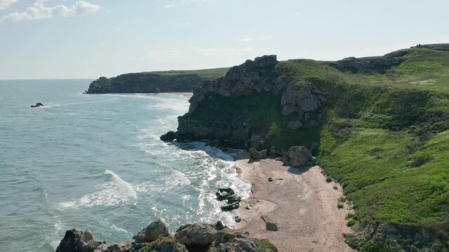 Coastline of wild bech on the sea. Nature and landscape scene.