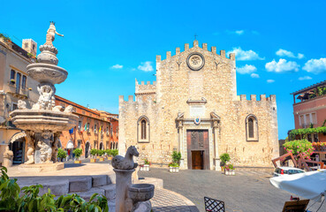Cathedral and fountain at Piazza del Duomo square in old town of Taormina. Sicily, Italy