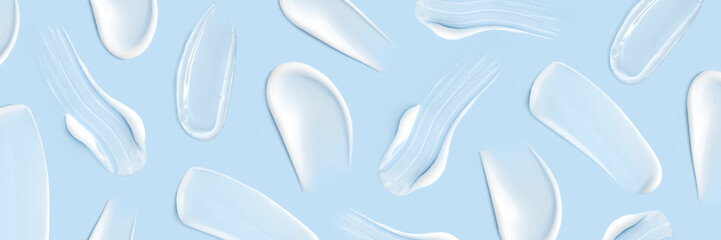 pattern cosmetic smears cream texture on pastel blue background