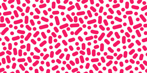 Seamless pattern of pink dots on white background.