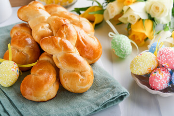 Easter breakfast Holliday concept. Easter bunny buns rolls with cinnamon made from yeast dough with...