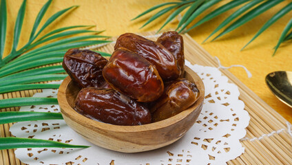 Selective Focus - sweet dried date palm fruits or kurma, ramadan (ramazan) food
