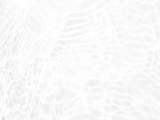 Defocus blurred transparent white colored clear calm water surface texture with splashes and bubbles. Trendy abstract nature background. Water waves in sunlight with copy space. White water shine