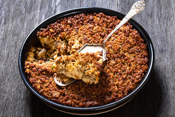 Tasty Bake with meat, mushrooms, cheese, onion