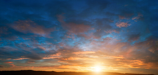 Fototapeta na wymiar cloudy sky panorama during summer sunset