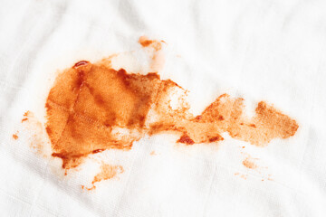 Dirty tomato sauce stain or ketchup on cloth to wash with washing powder, cleaning housework...