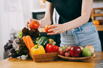 Asian woman eating breakfast and fruit
