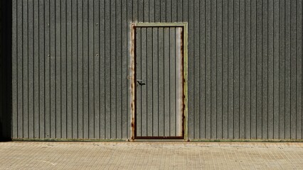 worn metal warehouse door background