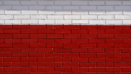 Fototapeta na wymiar brick wall painted white and red as a background