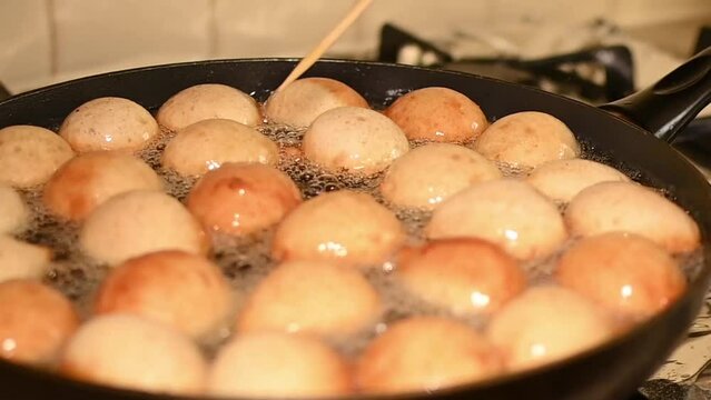 Puff puff or doughball in large frying pan