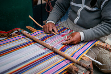 sewing in beautiful cusco - obrazy, fototapety, plakaty