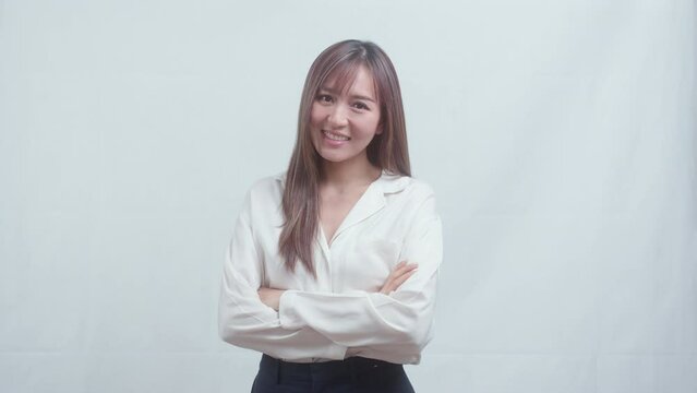 Portrait of beautiful asian businesswoman over white background studio