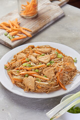 Chicken chow popular oriental dish with noodles and vegetables