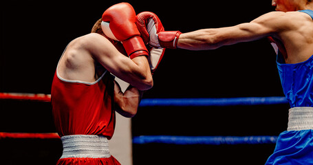 boxer lands left jab to head through his gloves