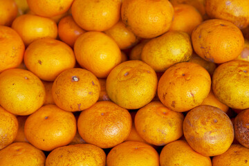Stack of Tangors on a market stall