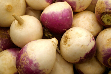 Stack of turnips on a market stall