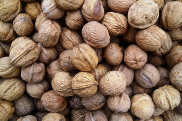 Stack of walnuts on a market stall
