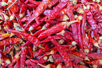 Stack of Moroccan dried red chili pepper on a market stall