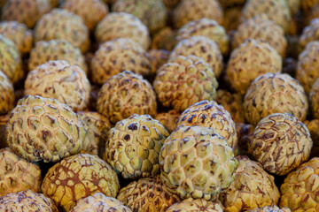 Stack of Sugar apples on a market stall
