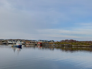 Fototapeta na wymiar Fishing boat to the fishing fields in Lofoten, Nordland county, Helgeland coast, Norway
