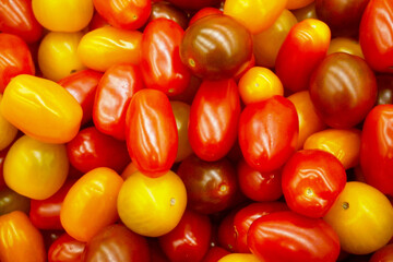 Stack of plum tomatoes a market stall