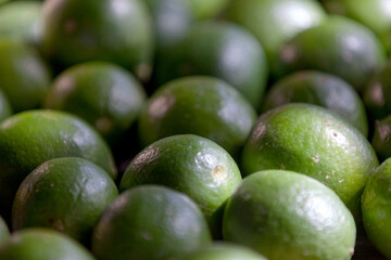 Stack of limes on a market stall