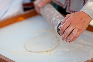 Medieval baker making a fouace