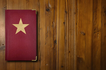 Communist book on a wooden desk