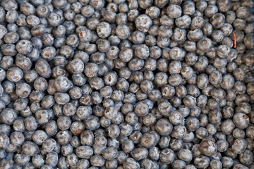 Stack of bilberries on a market stall