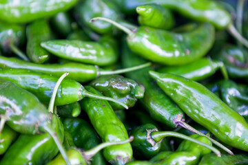 Stack of Gros piments on a market stall.