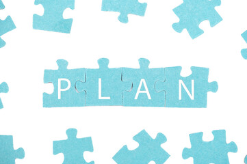 Naklejka premium Puzzle pieces on a white background. Business concept or web banner, header for plan
