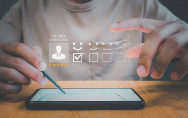 Customer service evaluation concept.Business people or customers show satisfaction.satisfaction rating and 5 stars.
