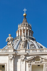 Fototapeta na wymiar Dome of Saint Peter's Basilica at St.Peter's square on background of blue sky, Vatican, Rome, Italy.