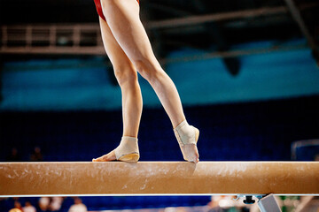 legs women balance beam gymnastics in summer games